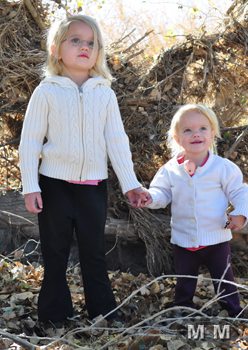 sisters holding hands in the fall leaves What Discipline Looks Like (in a non spanking family)